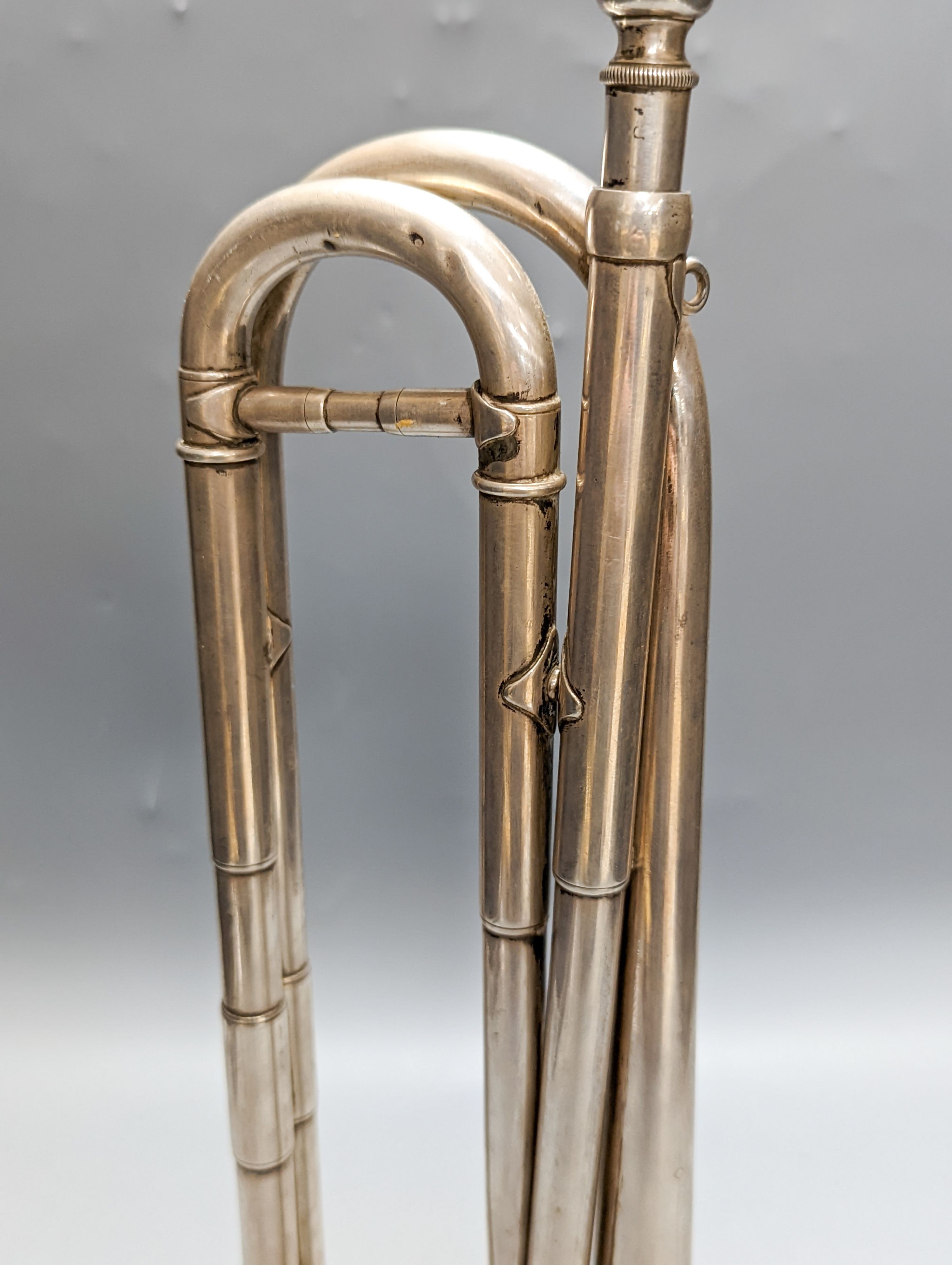 A Rudall Carte & Co manufacturers 23 Berners Street Oxford Street London No.4084 military bugle or cavalry trumpet, 43cm